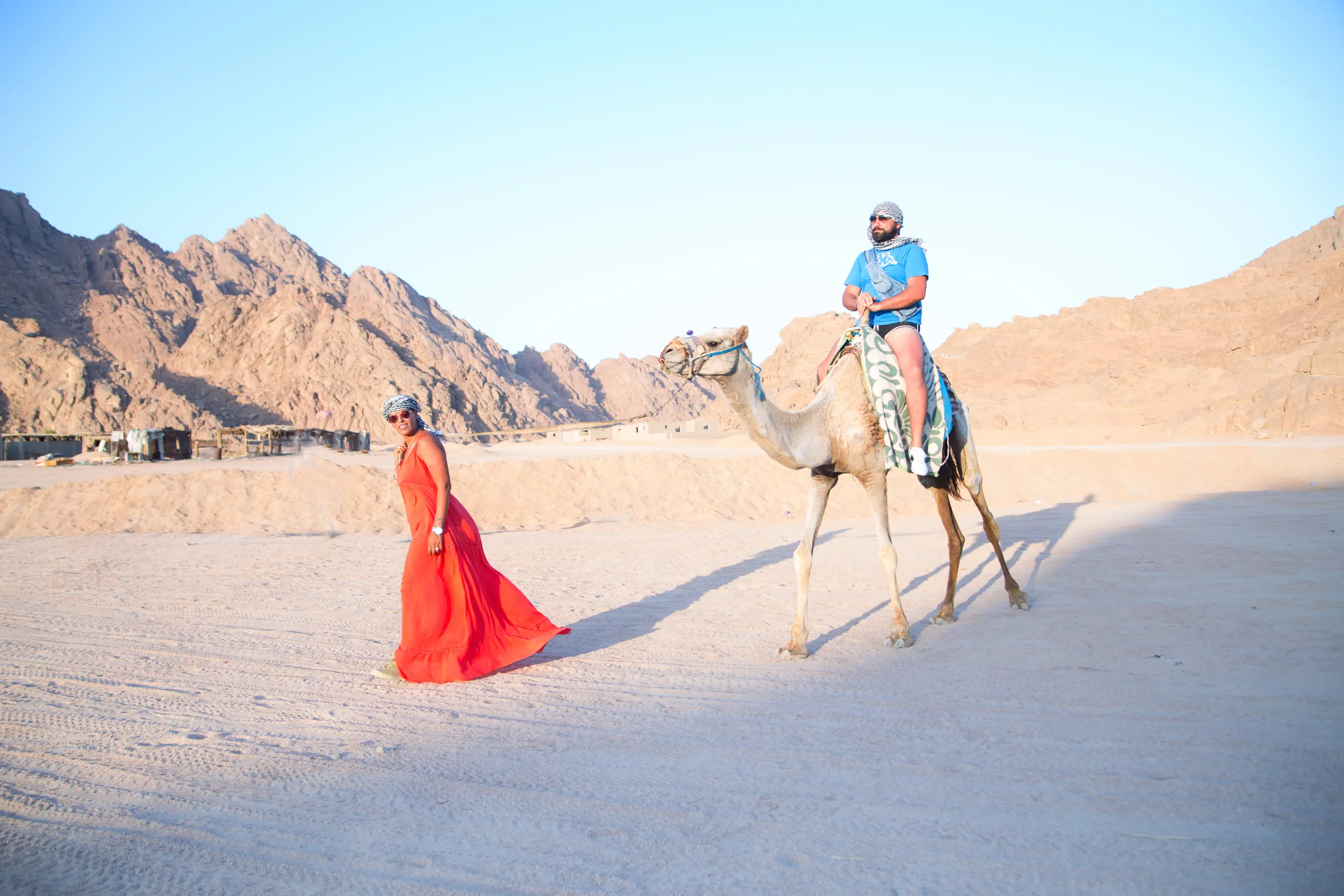 Camel Riding In Desert